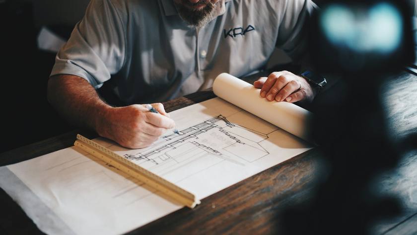 Contractor marking up a plan