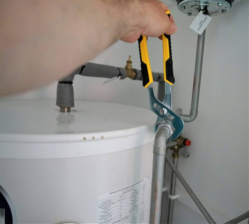 Plumber on the job
