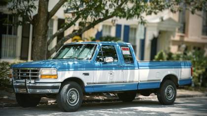 Work truck parked on a residential street